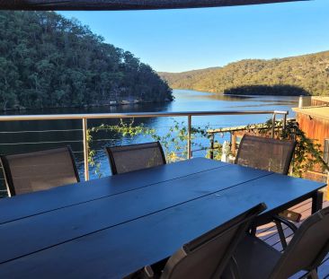 Tranquil Waterfront Living – Fully Furnished Oasis Just Minutes fro... - Photo 1