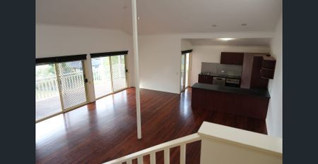 Family-Friendly Living with Ducted Air & Spacious Backyard – Pacific Pines - Photo 2