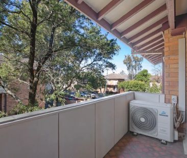 “Tidy Two Bedroom Unit” - Photo 1