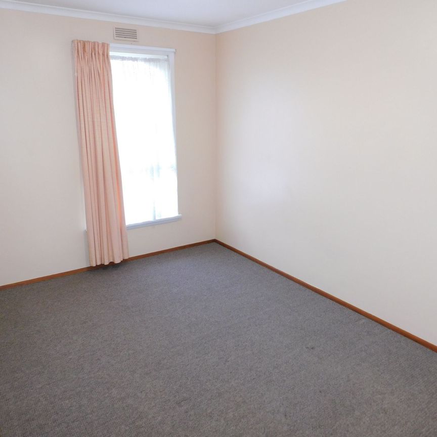 SPOTLESSLY CLEAN TWO BEDROOM UNIT CLOSE TO SHOPS, SCHOOLS AND TRANSPORTATION - Photo 1