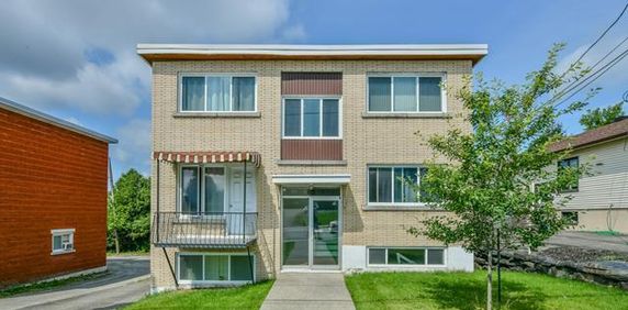 Grand appartement 4 1/2 a louer - Photo 2