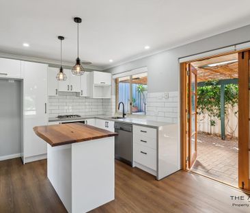 Beautifully renovated 3 bedroom - Photo 6