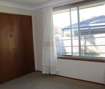 Tidy Two-Bedroom Unit in Peaceful Location - Photo 3