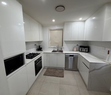 Spacious 4-Bedroom Family Home with Modern Features - Photo 6