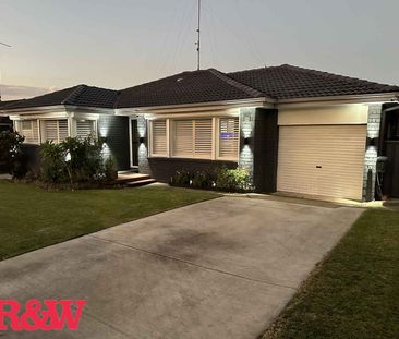 SPACIOUS HOME IDEAL FOR FAMILIES WITH CHILDREN ! - Photo 1