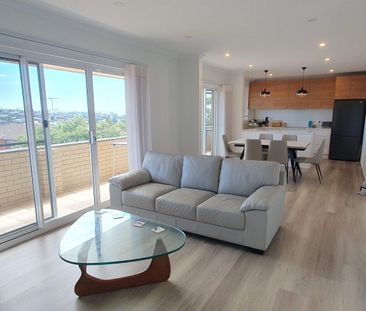 Fully Furnished Coastal Apartment with Ocean Views - Photo 1