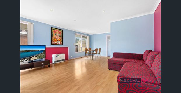 Spacious Family Comfort in a Prime Location - Photo 1