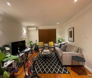 Stylish Single Level Unit in Unbeatable Location! - Photo 1