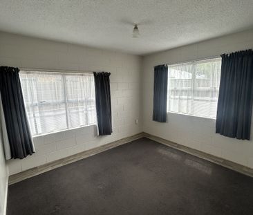 This tidy two-bedroom ground-floor unit is located in a quiet block... - Photo 3