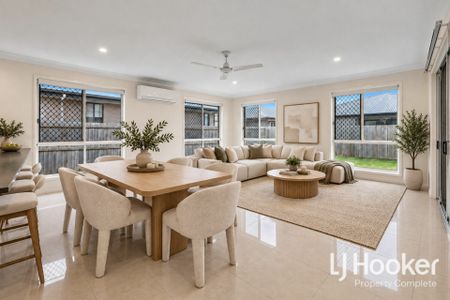 Modern Low-Maintenance Home with Stylish Interiors - Photo 2