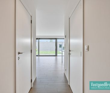 Gelijkvloersappartement met tuin en garage - Foto 1
