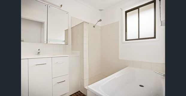 Spacious Family Home with Modern Updates & Self-Contained Retreat! - Photo 1