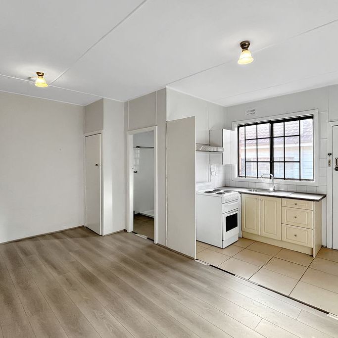 Two Bedroom Unit – Steps from the Beach! - Photo 1