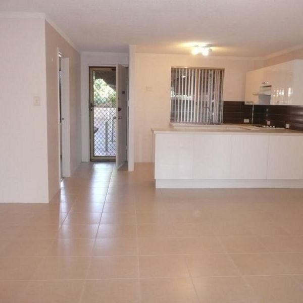 RENOVATED DELIGHT WITH AIR CON, DRYER & PRIVATE COURTYARD - Photo 1
