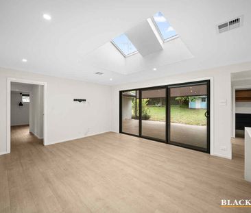 BEAUTIFULLY RENOVATED HOME WITHIN WALKING DISTANCE TO TCH - Photo 1