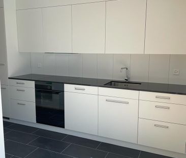 Moderne 2-Zimmerwohnung an ruhiger Lage mit grossem Gartensitzplatz - Photo 3