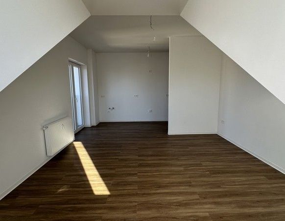 Helle 1-Zi.-Dachgeschosswohnung mit Ausblick - Foto 1