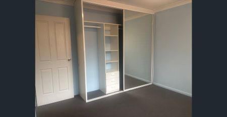 Expansive Top Floor Living With Lock-up Garage - Photo 2