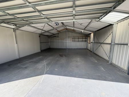4 Bedrooms + Huge Garage + Pet Friendly! - Photo 3