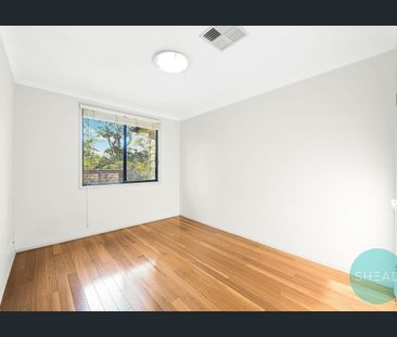 MODERN TWO LEVEL BRICK FAMILY HOME AT LEAFY LOCATION - Photo 3