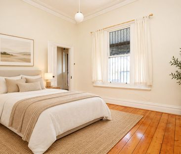 Three-Bedroom Home with Rear Courtyard and Storage - Photo 3