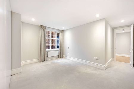 The property has been recently refurbished and is situated on the ground floor of a well run period mansion block close to Sloane Square and Knightsbridge. - Photo 2