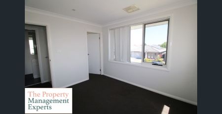 Spacious Four-Bedroom Family Home in a Prime Location! - Photo 4