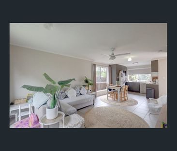 Three Bedroom Townhouse with Backyard! - Photo 1