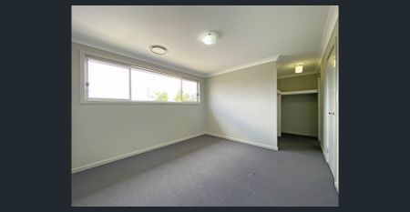 Modern Family Home in Prime Convenience | Walk to Schools, Station & Park - Photo 4