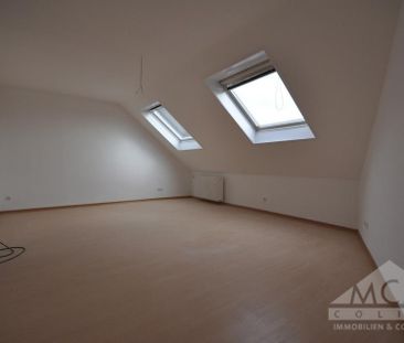 Gepflegte Dachgeschosswohnung in ruhiger Lage Neu-Isenburgs - Foto 1