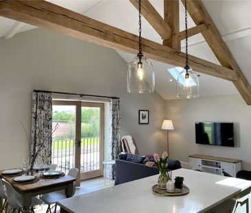 High specification barn conversion with additional separate two bedroom apartment, double garage, gated parking and South facing garden - Photo 6