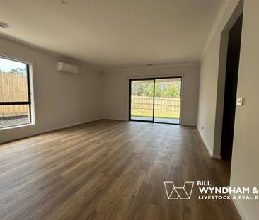 Spacious Family Living with Multiple Living Areas - Photo 2