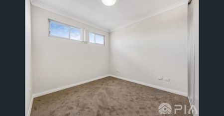 Modern 2-Bedroom Apartment in the Heart of Homebush - Photo 4