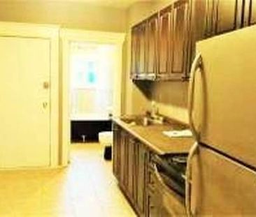 (DOWNTOWN) 2-Bedroom SUITE, Whole MAIN Floor, Own Entry! - Photo 1