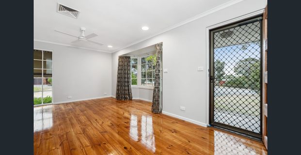 Charming Renovated 3-Bedroom Home with Modern Amenities and Fantastic Outdoor Space - Photo 1