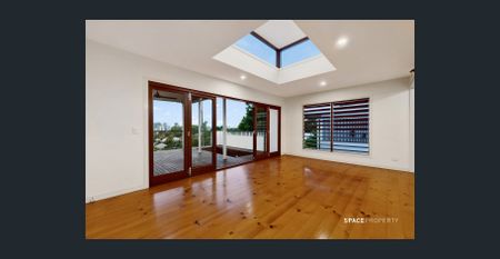 City Retreat with Enchanting Green Backdrop - Photo 2