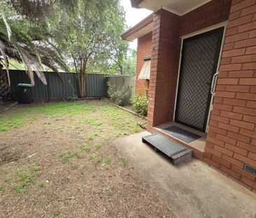 Charming 2-Bedroom Unit – Ideal for Comfortable, Low-Maintenance Li... - Photo 4