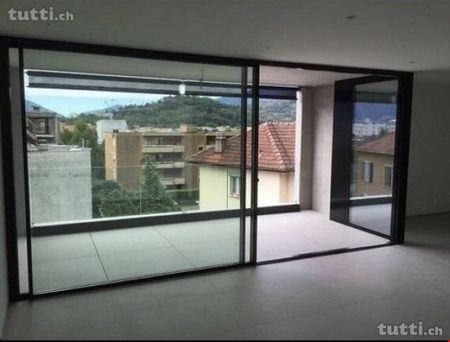 Appartamento moderno di 3.5 locali con balcone e vista panoramica a Solduno - Photo 2