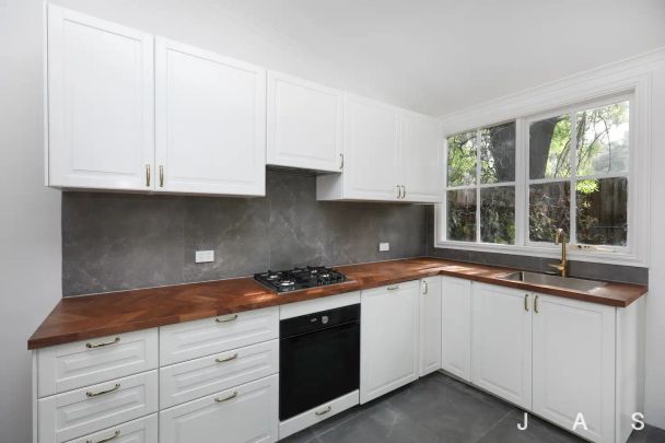 “LOVELY TWO BEDROOM WITH UPDATED BATHROOM” - Photo 1