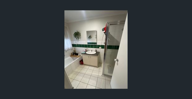 Spacious 4-Bedroom Family Home in a Prime Location! - Photo 1