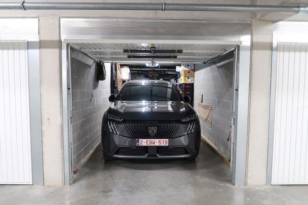 Nieuwbouwappartement in een groene zone met Garagebox - Photo 1