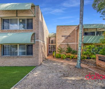RENOVATED UNIT IN PRIME LOCATION - Photo 2
