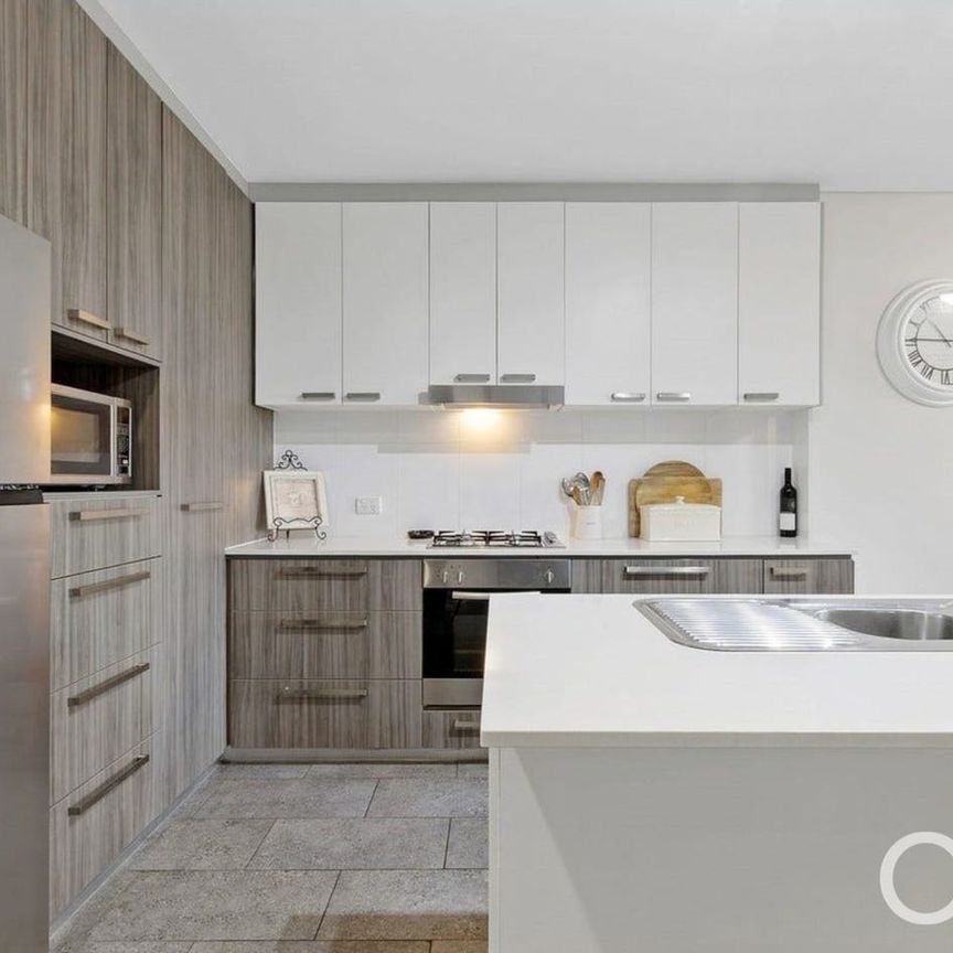 Open the Door to Effortless Living in the Heart of Mawson Lakes - Photo 1