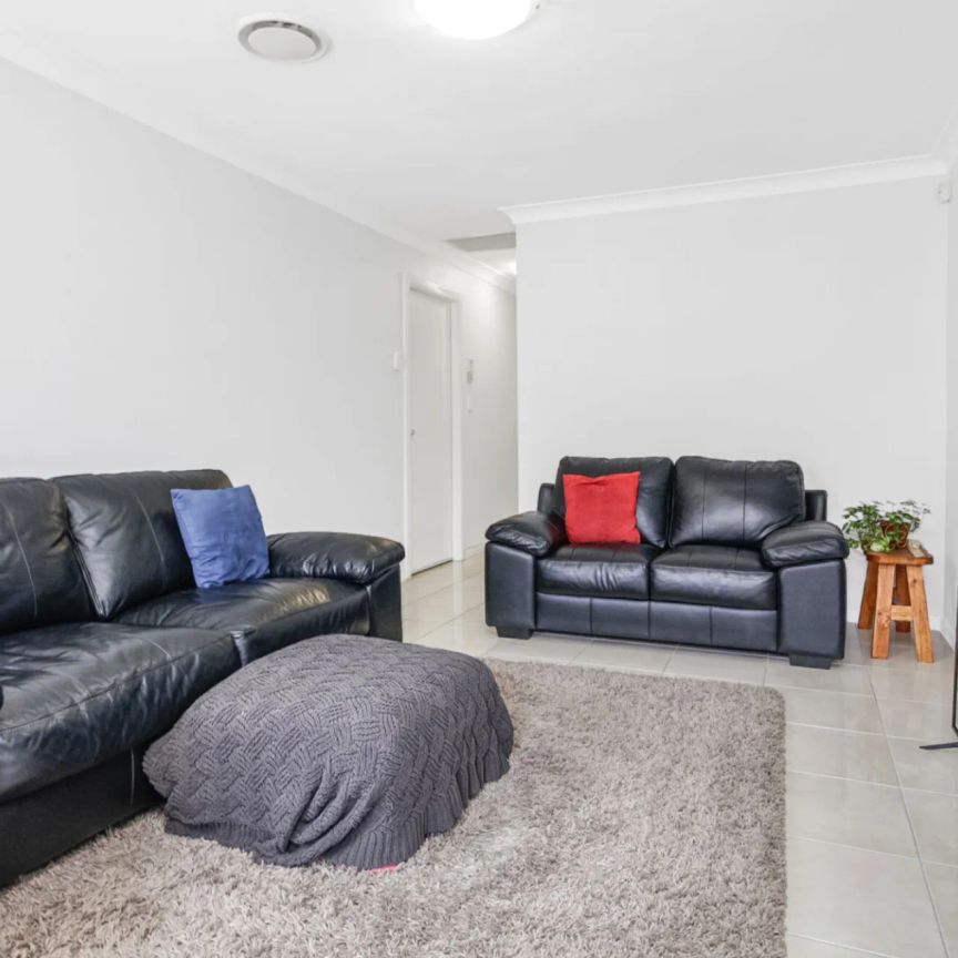 Immaculate and Convenient Two Bedroom Villa - Photo 1