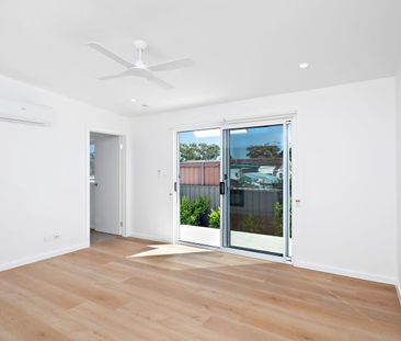 BRAND NEW ARCHITECTURALLY DESIGNED HOME WITH OFF-STREET PARKING - Photo 1