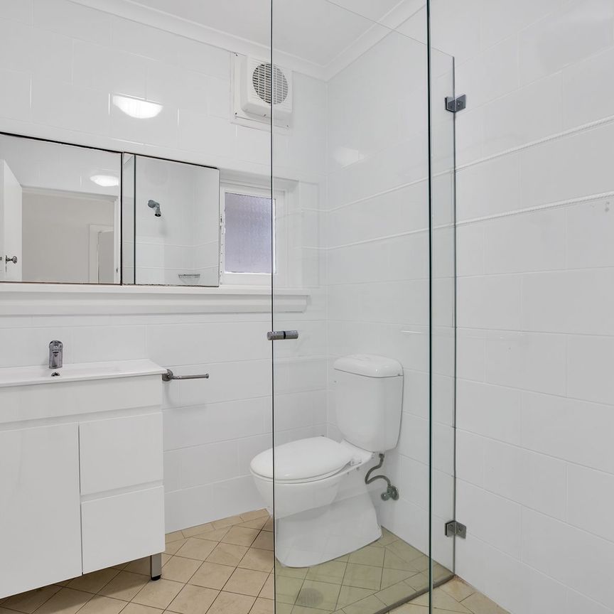 Updated light filled two bedroom apartment in amazing location - Photo 1