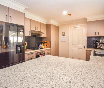 Comfortable & Low-Maintenance Living in a Quiet Location - Photo 1