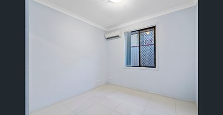 Modern Family Home with Split-System Air-Conditioning Throughout - Photo 4