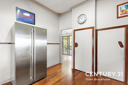 Charming 1950s Home with Modern Flexibility & Pristine Gardens! - Photo 2