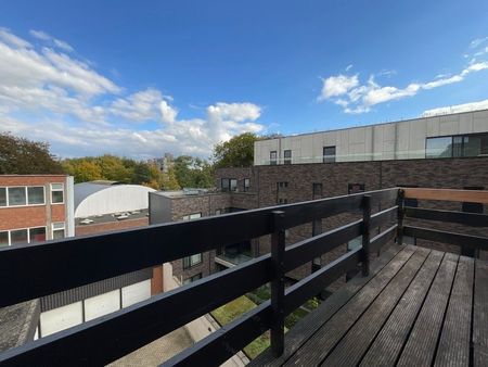 Gezellig duplexappartement in het centrum van Beveren met twee slaapkamers, terras en garage - Photo 5